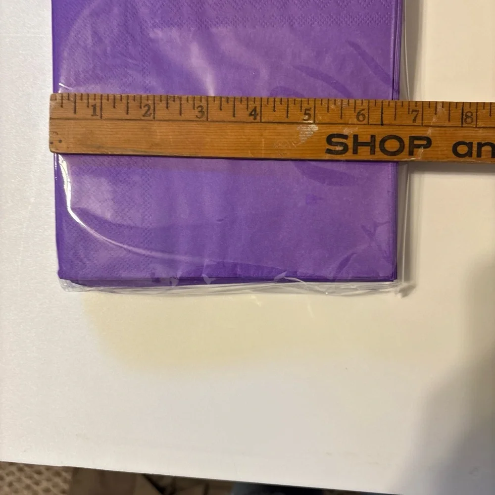 Purple disposable napkins. 150 in each box.